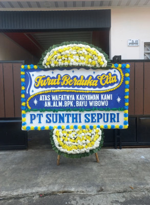 Papan Bunga Duka di Blokang
