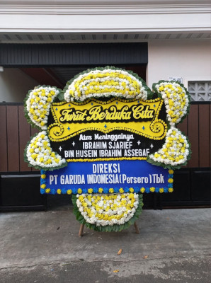 Papan Bunga Duka di Blokang