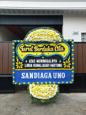 Papan Bunga Duka di Blokang