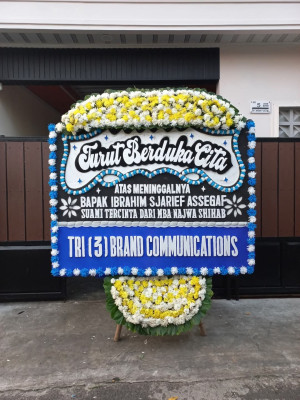 Papan Bunga Duka di Blokang